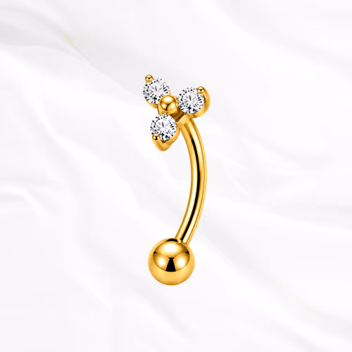 Piercing rook banane en titane doré La Triforce Courbée, trois zircons ronds en triangle sans monture apparente