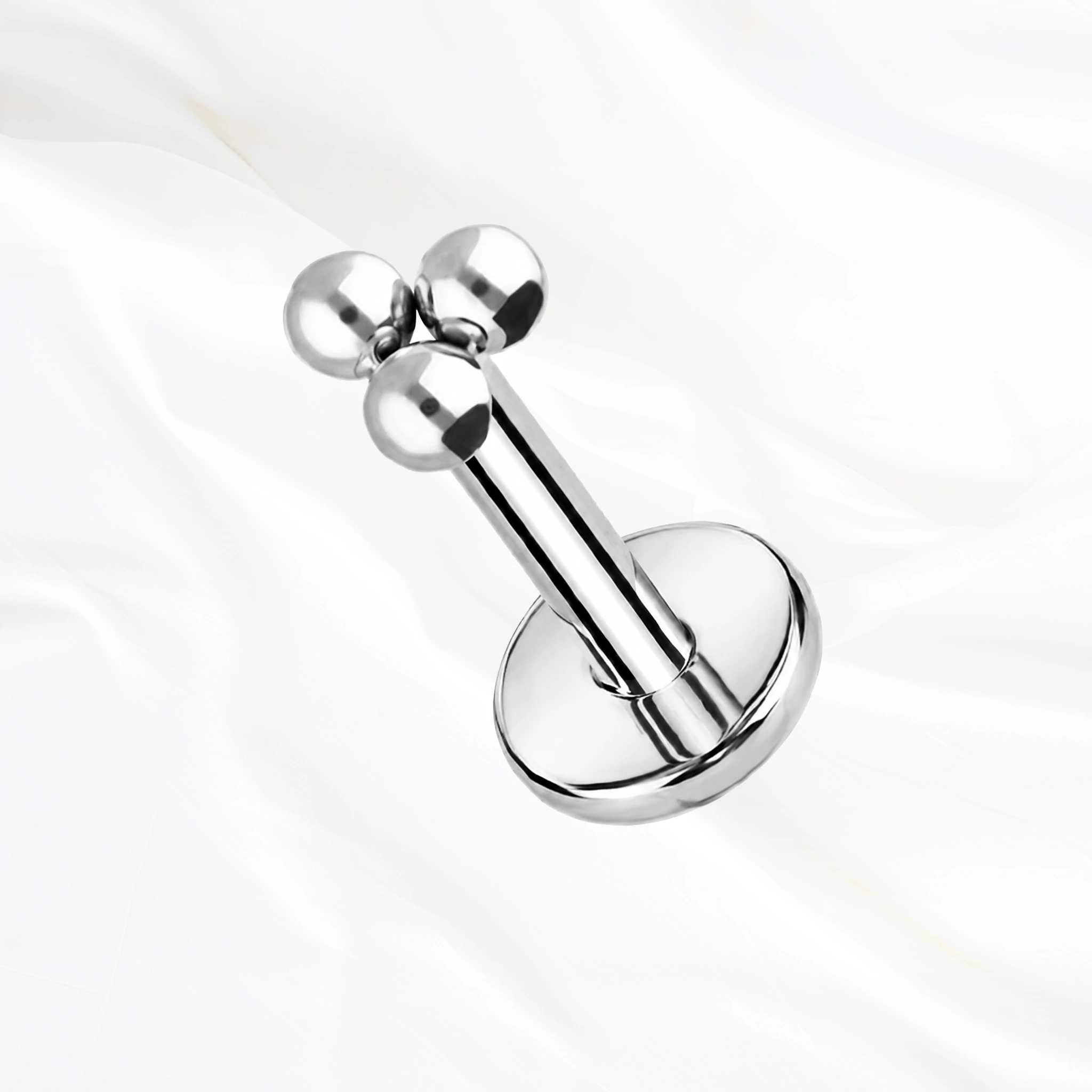 Labret push-in en titane argenté La Triforce V3, trois boules de titane pleines et polies disposées en triangle serré