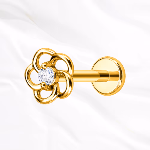 Labret push-in en titane doré La Marguerite, cinq pétales ajourés en fil de titane autour d’un zircon